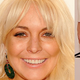 Illustration for article titled Fashion Week Begins, and Lindsay Lohan Is a Stain on the Red Carpet